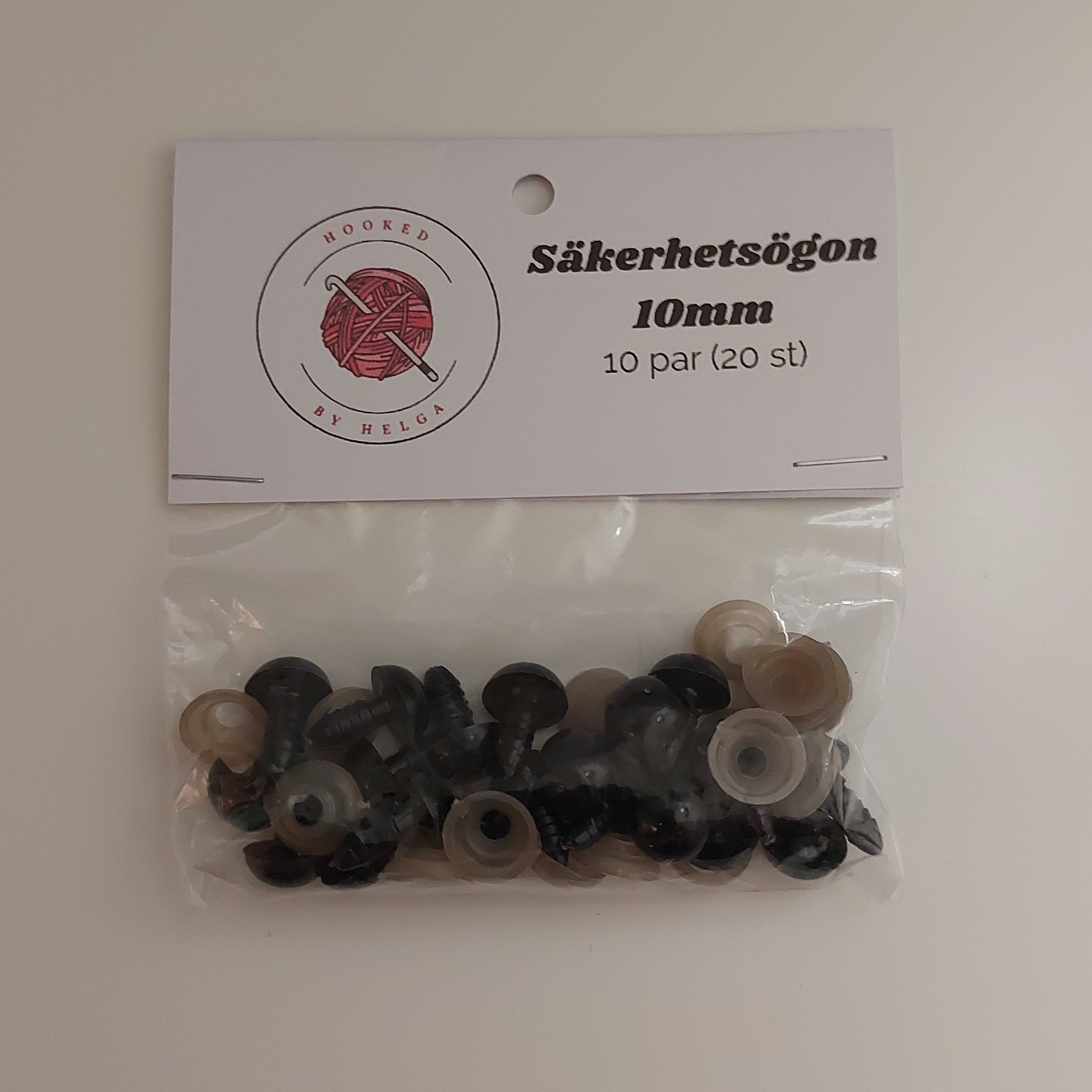 Svarta säkerhetsögon i olika storlekar