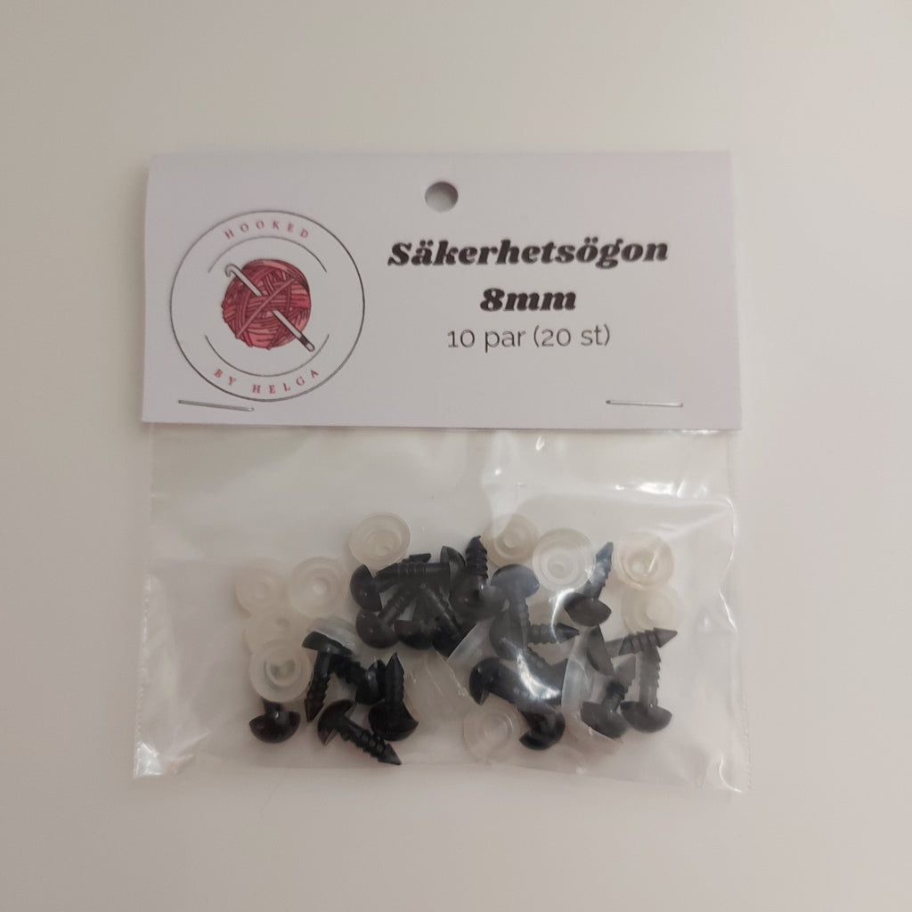 Svarta säkerhetsögon i olika storlekar